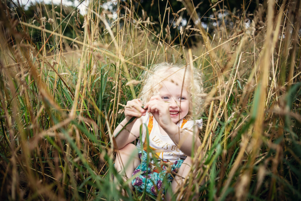 Natural Family Photography of Child in Grasses